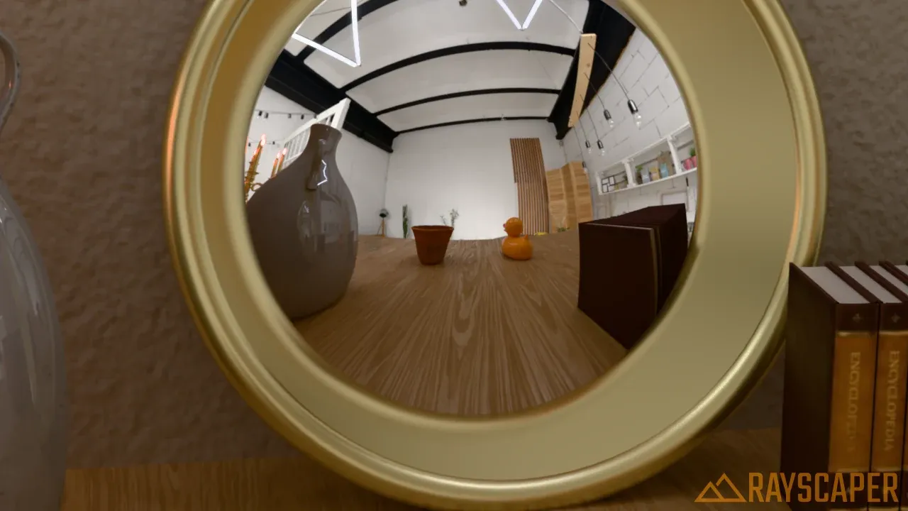 A round mirror in a brass frame reflecting the room